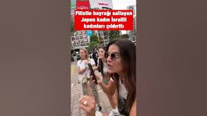 Tokyo’da Japon bir kadın Filistin bayrağı salladı İsrailli kadınlar çıldırdı